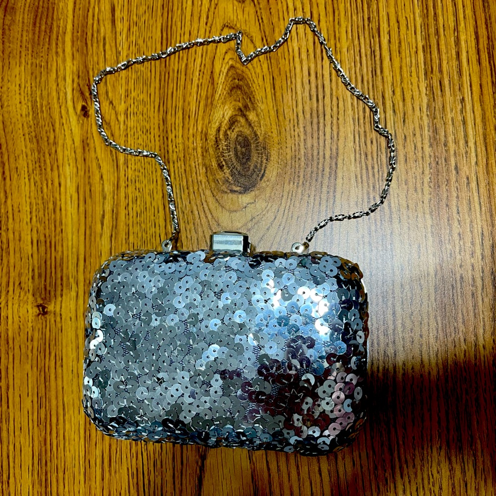 Jessica McClintock silver sequined hard sided purse evening bag.